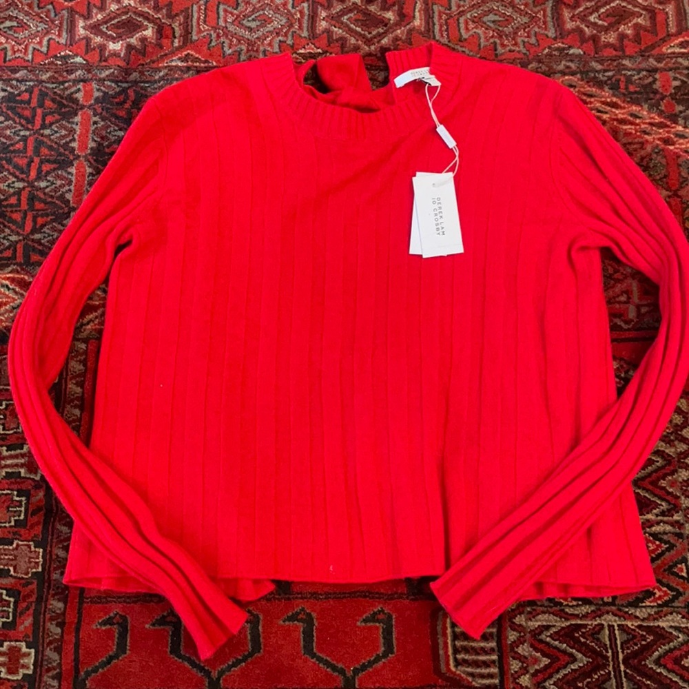 Open back poppy colored knit sweater